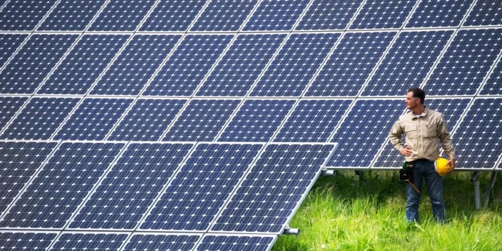 Solar panels charging a generator during a natural disaster